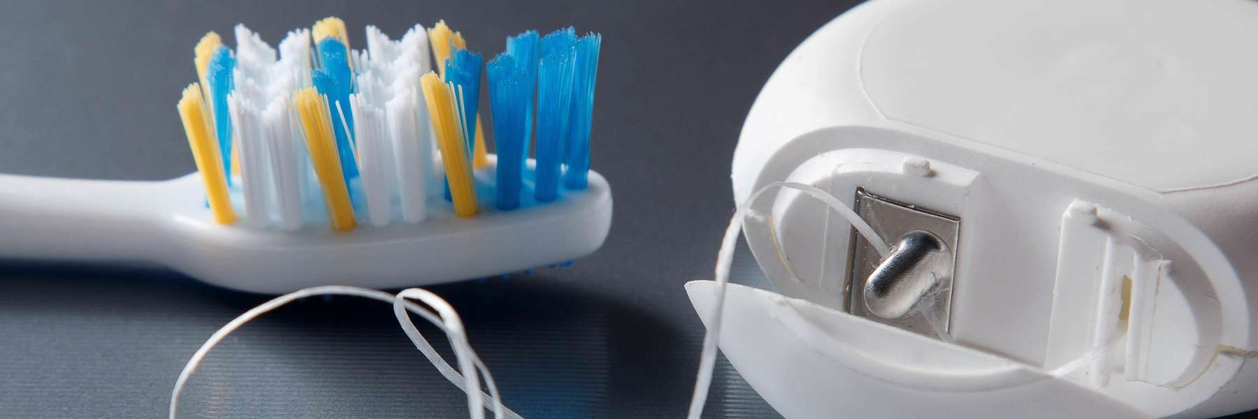 Picture of a tooth and dental floss in Edina, MN