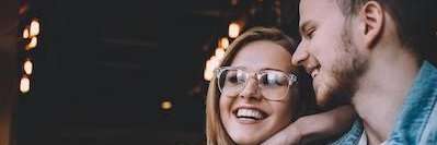 Couple smiling after dental bridge fillings in Edina, MN 