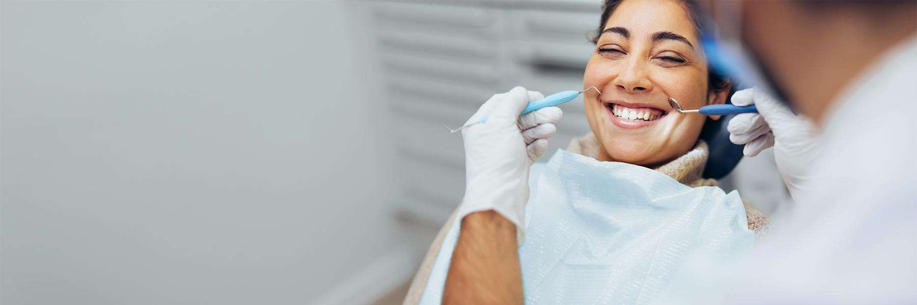 Lady undergoing dental examination in Edina, MN