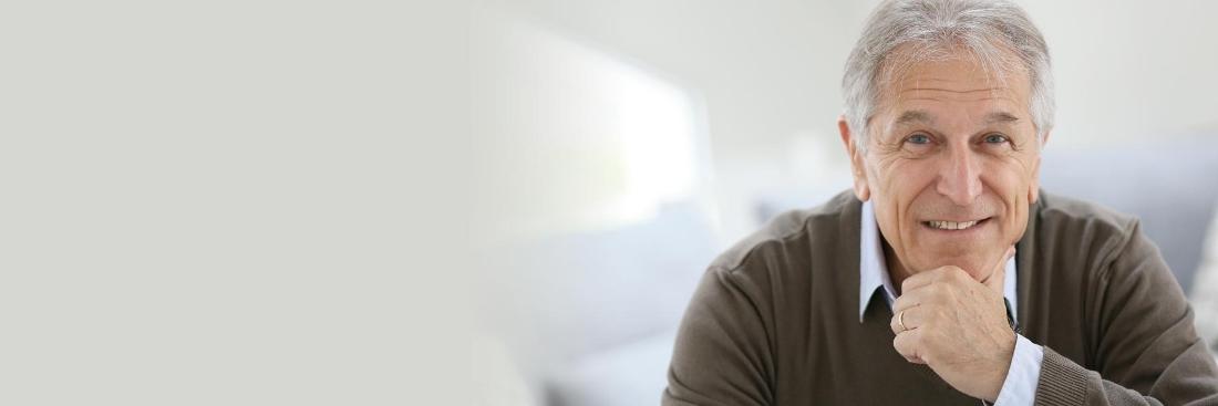 Man smiling after getting dental implants in Edina, MN