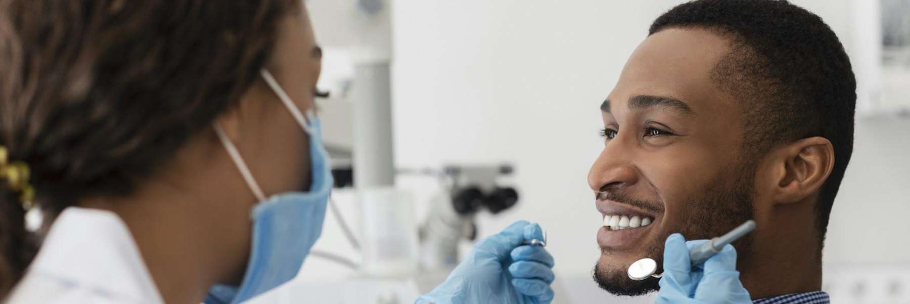 A man seeking dental Implants vs. Other Tooth Replacement Options in Edina MN