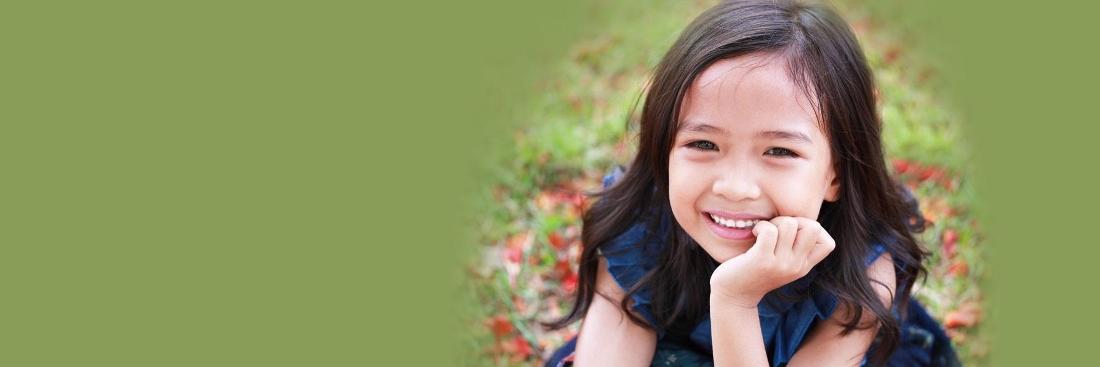 Young girl smiling after dental check up in Edina, MN
